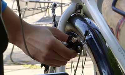 Using a cone wrench on a bike